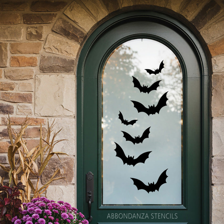 Halloween-Schablone mit drei fliegenden Fledermäusen